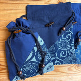 Indigo-dyed drawstring pouch